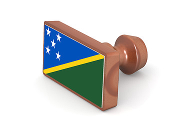 Image showing Wooden stamp with Solomon Islands flag