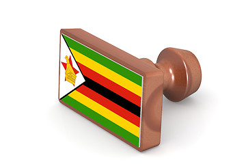 Image showing Wooden stamp with Zimbabwe flag