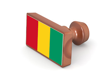 Image showing Wooden stamp with Guinea flag