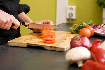 Image showing Slicing Tomatoes Detail