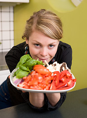Image showing Female Offering Vegetables