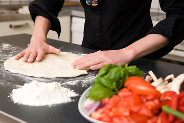 Image showing Making Pizza Dough Detail