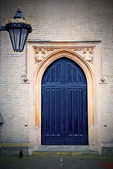 Image showing brown wooden parliament in london old  door and marble antique  