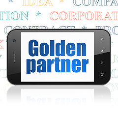Image showing Finance concept: Smartphone with Golden Partner on display