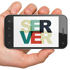 Image showing Web design concept: Hand Holding Smartphone with Server on  display