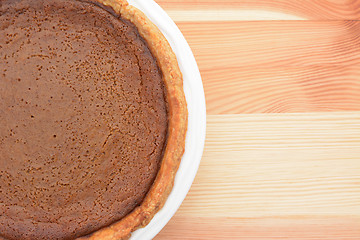 Image showing Close-up of a pumpkin pie on a table