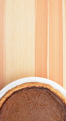 Image showing Thanksgiving pumpkin pie on wood