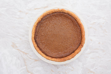 Image showing Thanksgiving pumpkin pie fresh from the oven