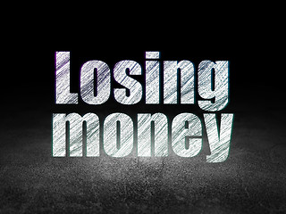 Image showing Currency concept: Losing Money in grunge dark room