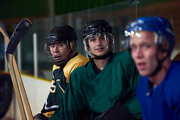 Image showing ice hockey players on bench