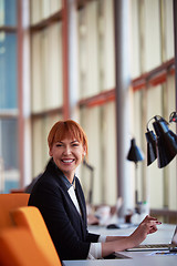 Image showing business woman working on computer at office