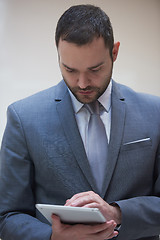Image showing business man with tablet