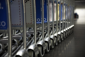 Image showing airport trolleys