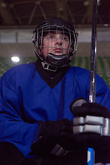 Image showing ice hockey players on bench