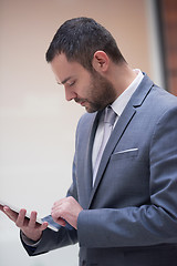 Image showing business man with tablet