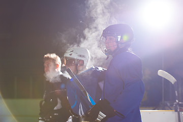 Image showing ice hockey players on bench