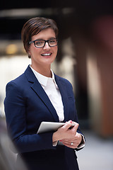 Image showing business woman working on tablet