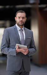 Image showing business man with tablet