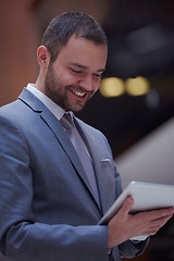 Image showing business man with tablet