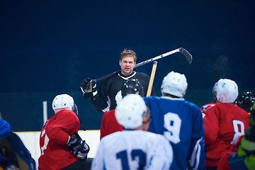 Image showing ice hockey players team meeting with trainer
