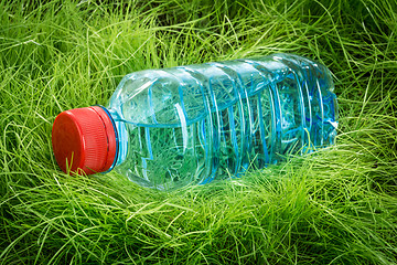 Image showing Water bottle on the grass