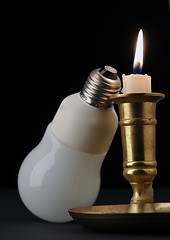 Image showing More light, aflame candle
