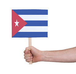 Image showing Hand holding small card - Flag of Cuba