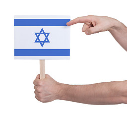 Image showing Hand holding small card - Flag of Israel