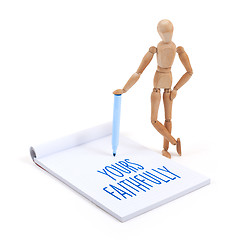 Image showing Wooden mannequin writing - Yours faithfully