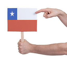 Image showing Hand holding small card - Flag of Chile