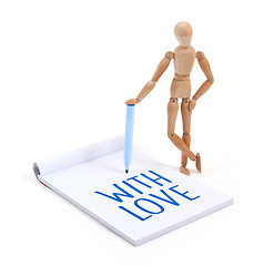 Image showing Wooden mannequin writing - With love
