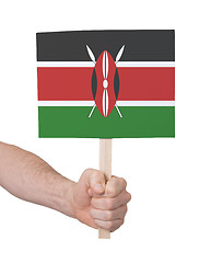 Image showing Hand holding small card - Flag of Kenya