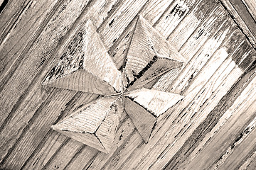 Image showing grain texture of a brown antique wooden old door in italy   euro