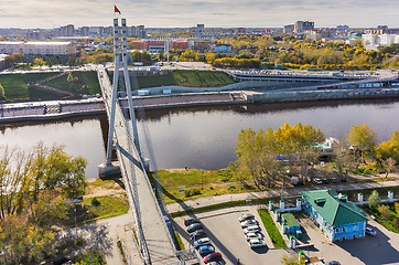 Image showing Pedestrian Lovers Bridge on Tura river. Tyumen