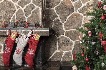 Image showing Christmas stockings and tree