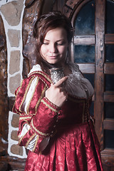 Image showing Pretty woman in red dress in retro baroque style