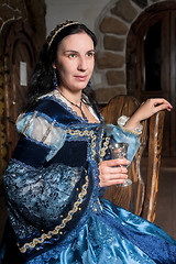 Image showing Attractive woman in red dress in retro baroque style