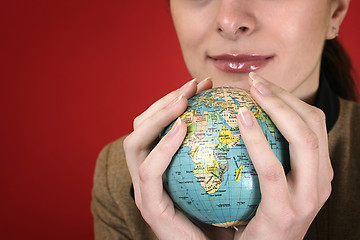 Image showing Globe in a girl's hands