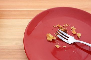 Image showing Crumbs from an eaten pumpkin pie
