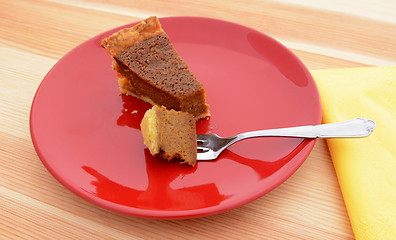 Image showing Bite of pumpkin pie on a fork