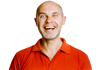 Image showing Unshaven laughing middle-aged man in a red T-shirt. Studio. isol