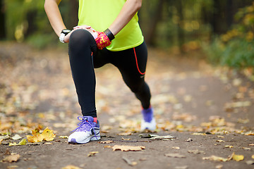 Image showing woman exercising and stretching muscles