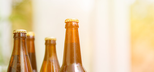 Image showing Close up of beer bottles