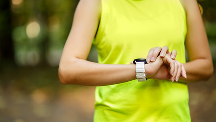 Image showing Close up image of woman checking time