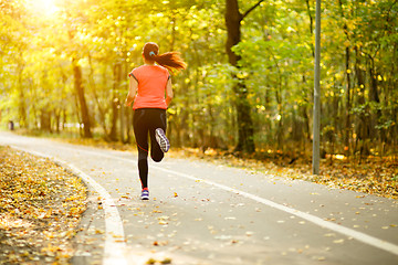 Image showing woman running in park