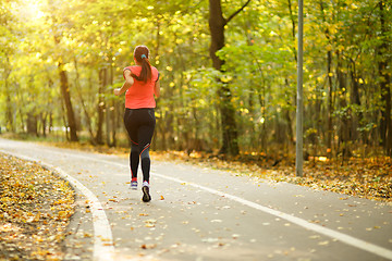 Image showing woman running in park