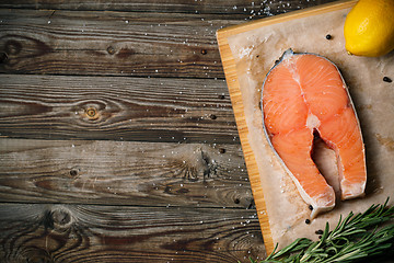 Image showing Salmon on wood background