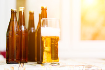 Image showing one mug of beer and bottels