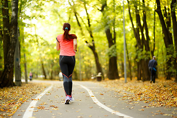 Image showing woman running in park