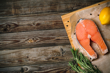 Image showing Salmon on wood background